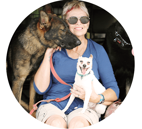 Joyce-with-dogs-round-web