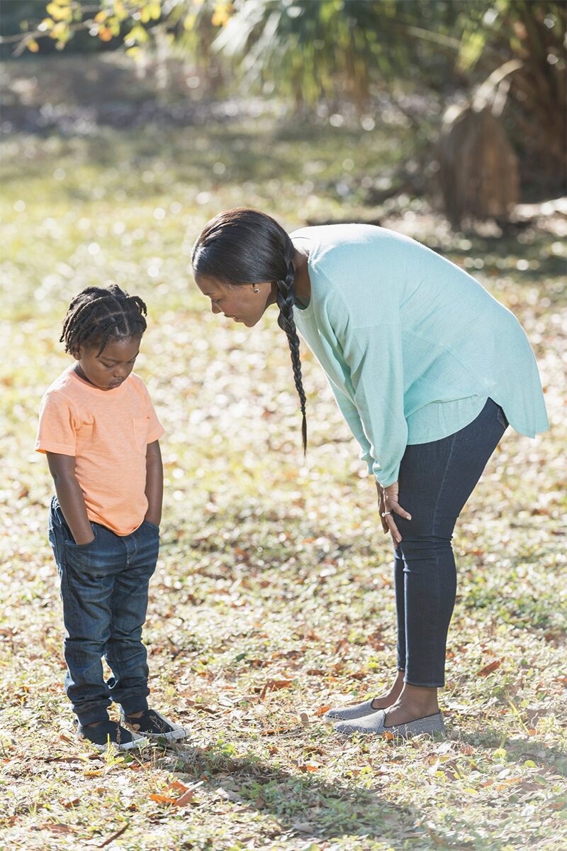 smaller AA mom and child saying no copy practical life