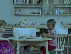 children working in a Montessori classroom