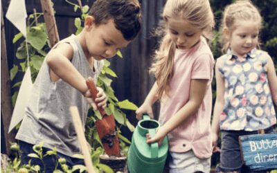 three children gardening