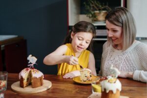 mother and child with cake